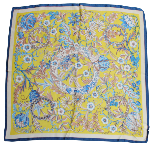 Thin yellow scarf with blue and white flowers